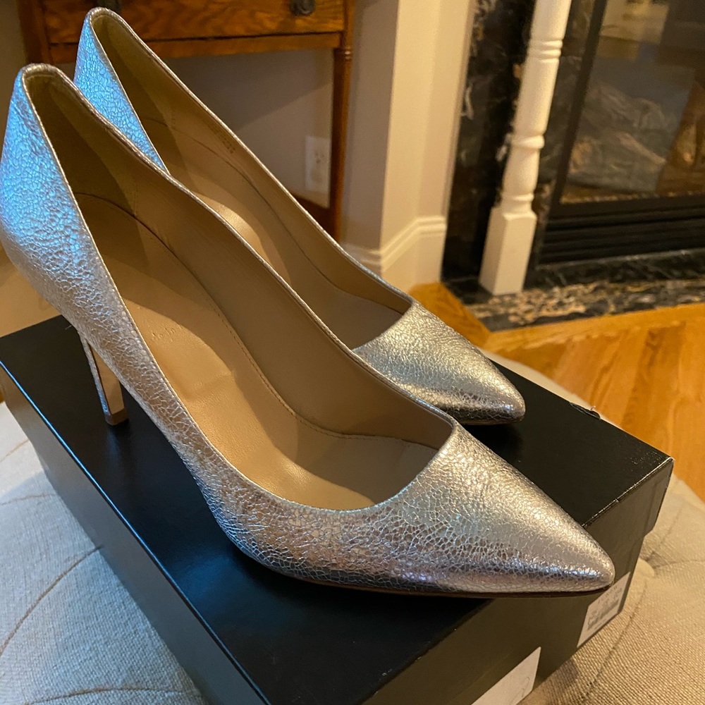 Almost new Silver all leather pumps